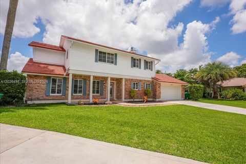 Photo of 5680 Thornbluff Ave, Davie, FL 33331 (MLS # A12026498)