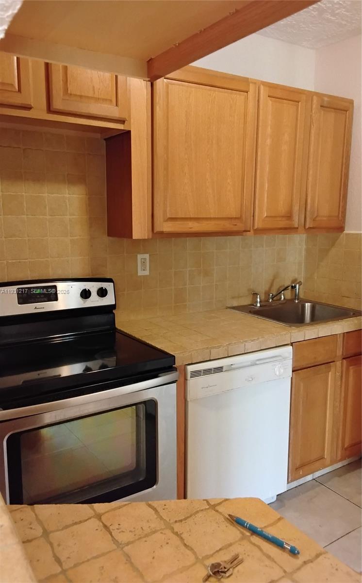 HAMPTON COURT CONDO - Residential