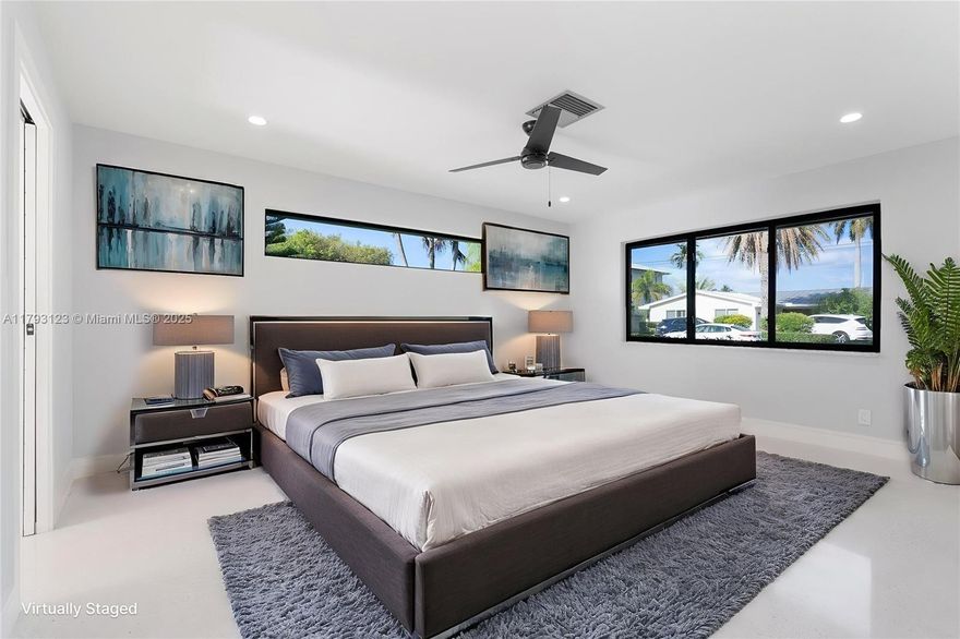 Step back in time while living in tomorrow's comfort. This architectural gem boasts terrazzo floors, meticulously restored to their vintage glory; walls of impact glass that dissolve boundaries between indoors and lush tropical surroundings; huge chef's kitchen w/ top-tier appliances that would make a culinary star envious; entertainment-ready patio featuring designer ceiling treatments; luxuriously reimagined bathrooms, including private guest and primary cabanas; smart home technology controlling climate, irrigation, and security.
New roof/gutters (2025); updated electrical (2025); HVAC (2021); 
Complete hurricane protection and energy-efficient features.
Mid-century charm meets South Florida sophistication -a coveted haven waiting for its next discerning owner.