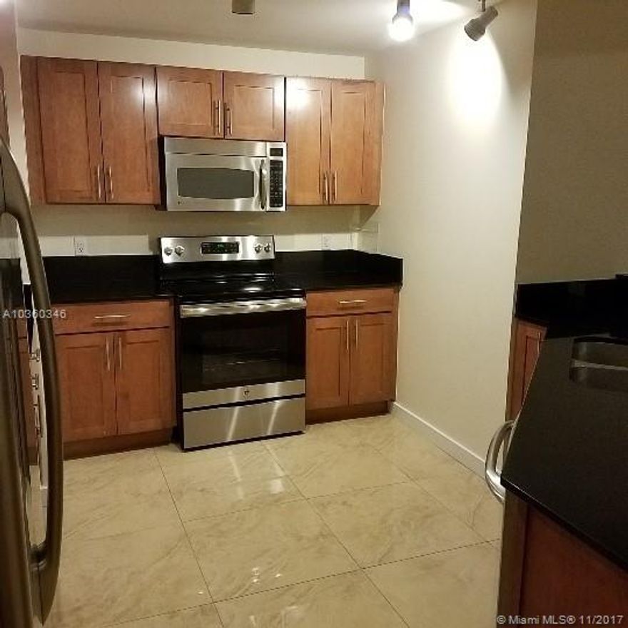 Spacious 2 bedroom 2 baths condo unit in desirable Colonnade at Dadeland. Huge living area! Porcelain floors throughout. Stainless steel appliances & granite tops. Blinds throughout. Double sink in master bath, Roman tub and separate shower. Plenty of closets. Great view from this top floor unit onto the canal. Gym & security. Easy access to everything. Basic cable & WiFi internet included. Move in with First month + security deposit