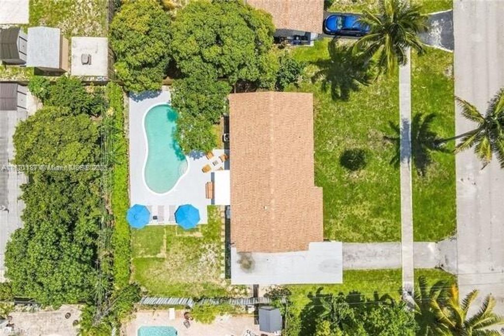 Photo of 4120 NW 3rd Way, Deerfield Beach, FL 33064 (MLS # A11821187)