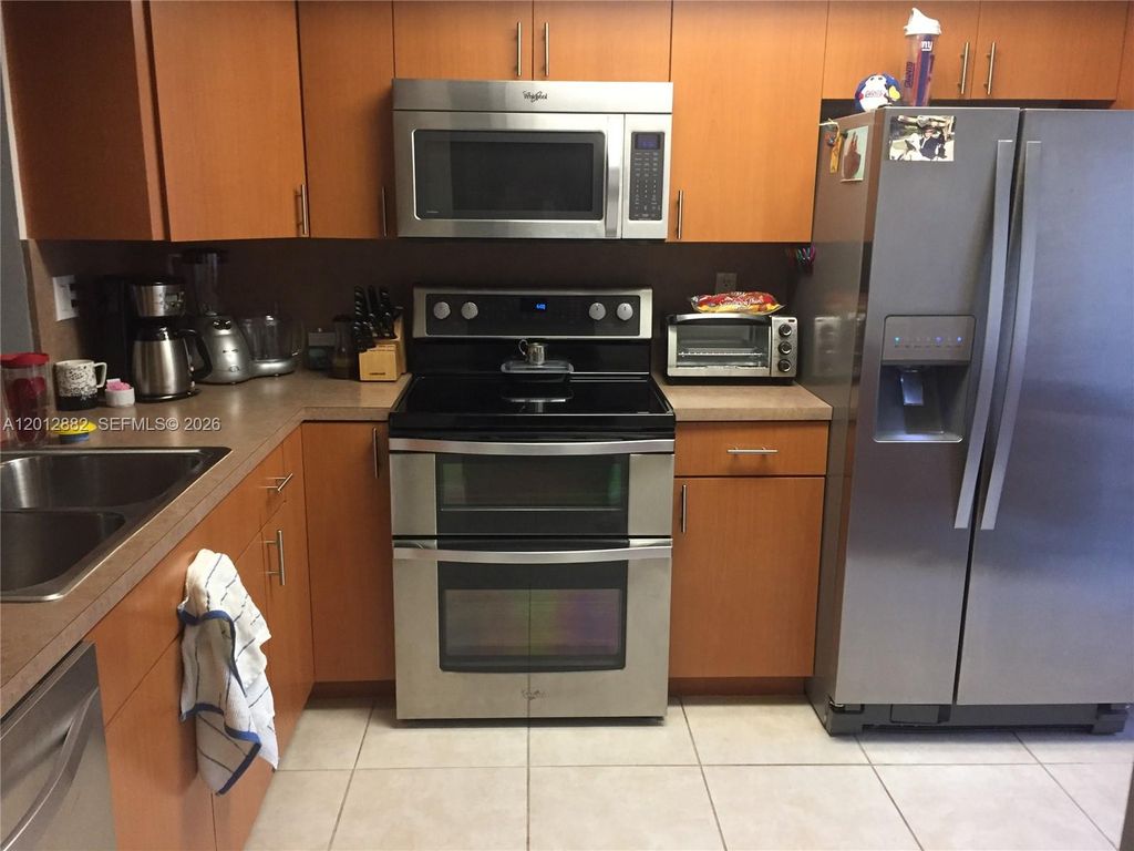 Photo of 9820 NW 65th Ct #B13, Tamarac, FL 33321 (MLS # A12012882)