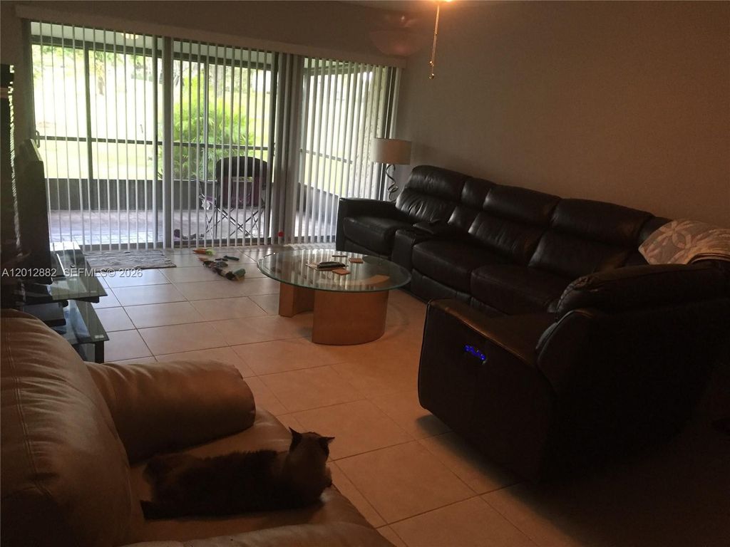 Photo of 9820 NW 65th Ct #B13, Tamarac, FL 33321 (MLS # A12012882)