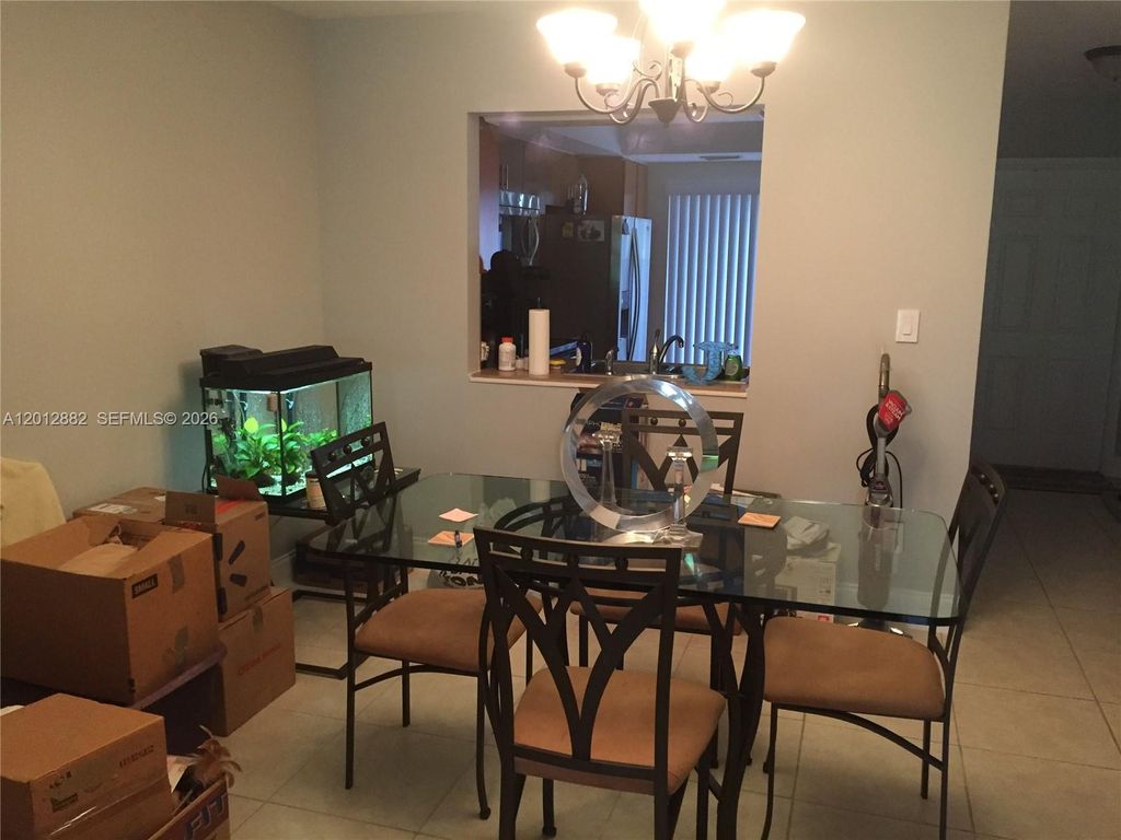 Photo of 9820 NW 65th Ct #B13, Tamarac, FL 33321 (MLS # A12012882)