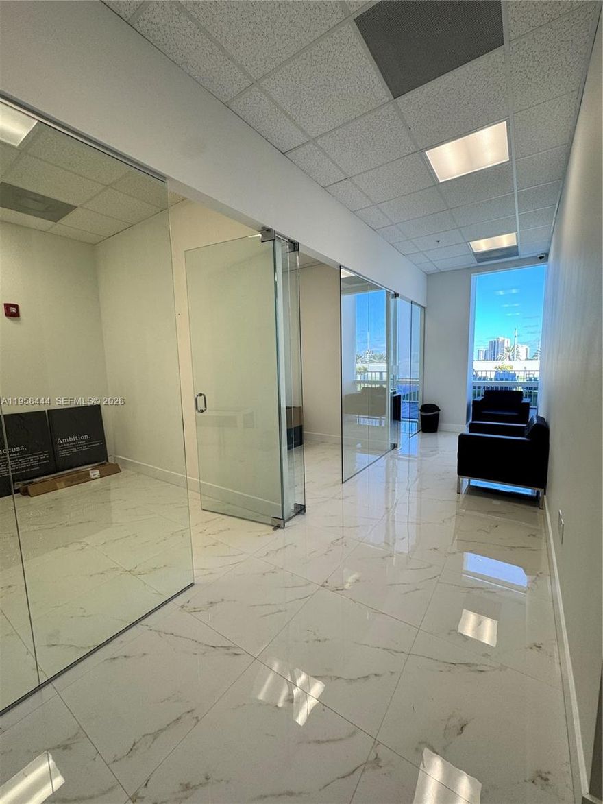 Discover an exceptional turnkey office opportunity in the heart of Aventura's bustling business and retail corridor. This beautifully appointed 640 square foot suite is perfectly positioned right in front of the iconic Aventura Mall, offering unparalleled visibility, convenience, and prestige.

The space features three fully private offices, making it perfect for executives, small teams, or client-facing professionals who need dedicated, distraction-free workspaces. It comes fully furnished and move-in ready with modern, high-quality furniture included, so you can hit the ground running. Located on the desirable 6th floor, the suite offers direct common access to a spacious outdoor terrace—providing breathtaking views, fresh air, and an ideal setting for breaks, casual meetings, or impressing clients in a relaxed, elevated environment.

Positioned just steps from Aventura Mall’s world-class shopping, dining, entertainment, and luxury amenities, this location places high-end retailers, restaurants, and cafes right at your doorstep—for both your team and your clients. Surrounded by Aventura’s thriving professional ecosystem, the property boasts excellent connectivity via major highways, public transit options, and close proximity to Miami’s key business districts.