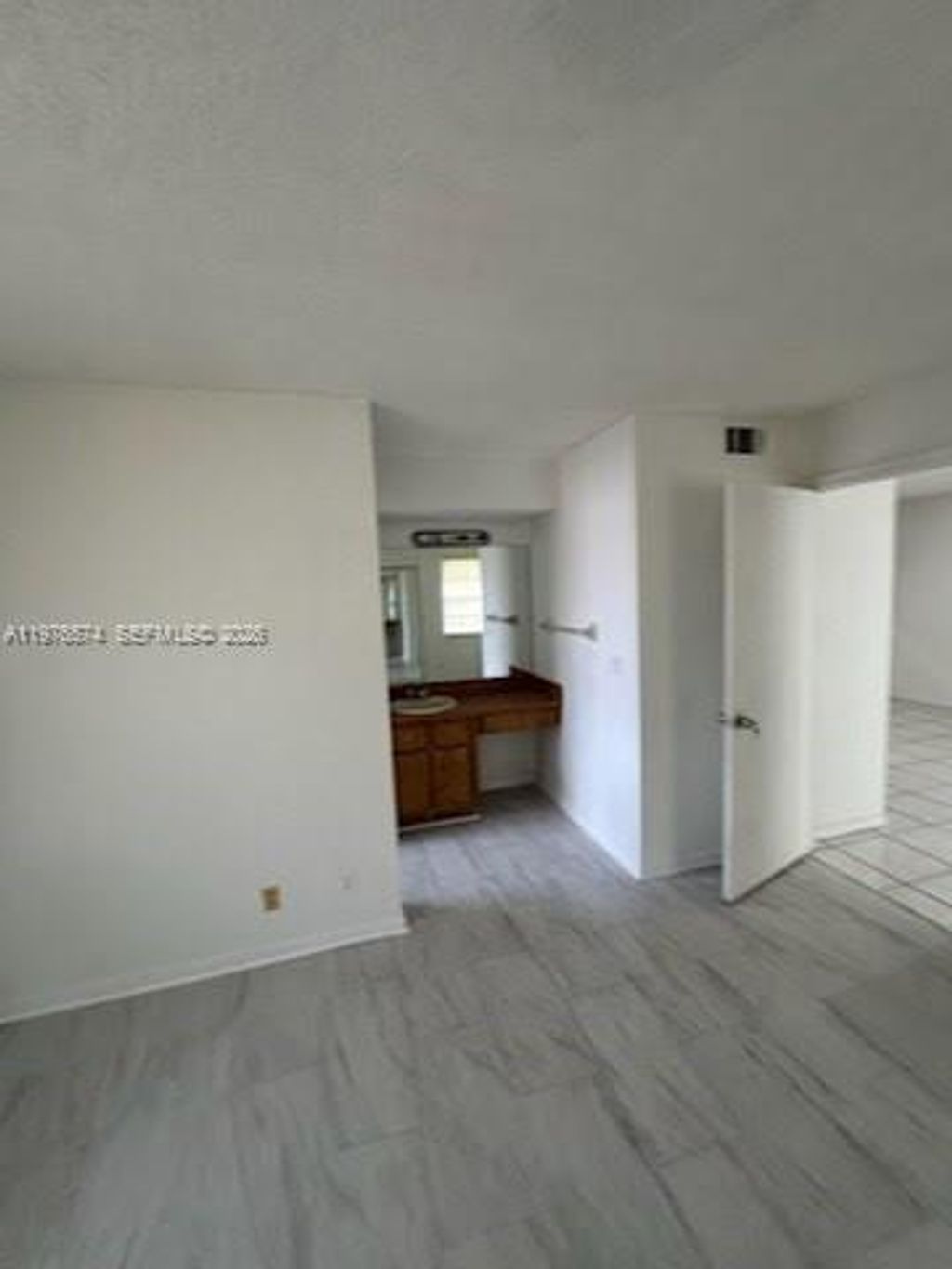 Photo of 10046 Twin Lakes Dr #6-L, Coral Springs, FL 33071 (MLS # A11976574)