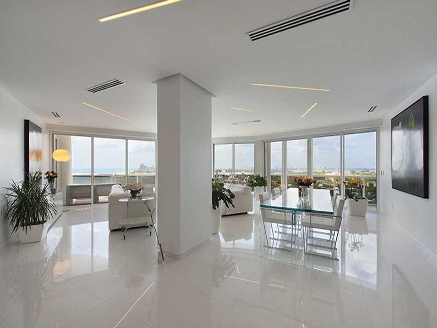 Sumptuous 4 bedroom penthouse high in the Bal Harbor Sky, offering the best unobstructed views to the Atlantic Ocean & the Sunset over Miami Skyline. This impeccable ultra-modern Italian Design masterwork offers no less than perfection to its smallest  de tail. From sleek profile Rimadesio doors to Antonio Lupi signature Bathrooms. Immaculate extra-large white Graniti Fiandre  porcelain flooring & Bisazza mosaics in baths. Lutron lighting & Savant Sound system w/ invisible speakers hidden in the ceiling.