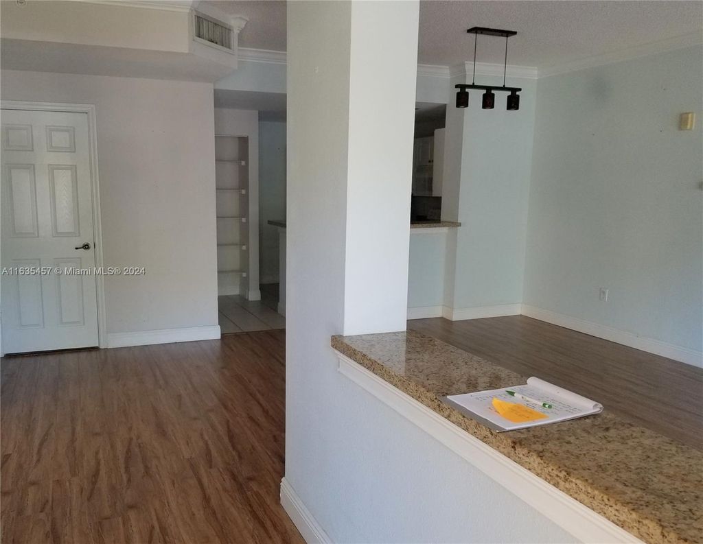 Photo of 2809 Amalei Dr #102, Palm Beach Gardens, FL 33410 (MLS # A11635457)