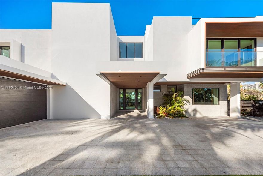 Unsurpassed Perfection in Golden Beach. 128 Ocean was recently refined by a team of expert craftsmen, who have carefully brought the estate to fulfill its potential for both entertaining and intimate family life. The grand 3 story foyer welcomes you with its awe-inspiring ambiance and 30' high ceilings. The house spans nearly 8000 sq ft and features 6 bedrooms, 7 bathrooms and 2 1/2 baths, a Custom Italian kitchen by Snaidero, a media room & an  expansive Master Suite. Outdoor dining and a well-appointed kitchen make alfresco entertaining part of daily living. Golden Beach is secured by its own police force. The town's amenities include a Private beach, tennis & a brand new community center for residents only. Moments from fine dining, high-end shopping, and a vibrant cultural scene.