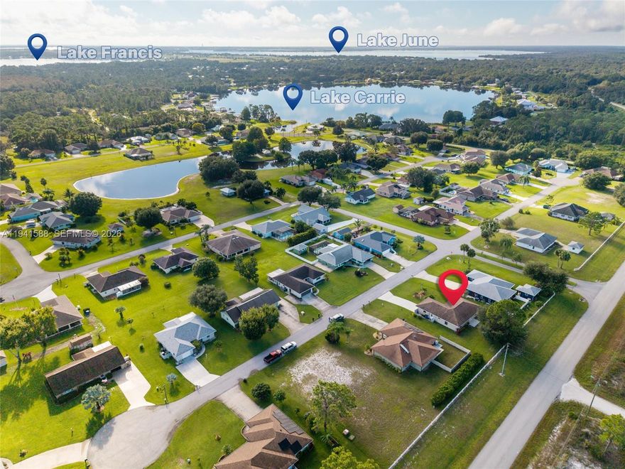 Bring your boat to this great waterfront community of Country Walk with its own marina on the shores of Lake Carrie with access to Lake June, & lake Henry, with no restriction & only $68 HOA fees! Dock rental $30/month. This clean & bright home built in 2009 still looks like new. Great layout. High ceiling, French doors open to the back yard. Immaculate landscape. This tranquil setting on Lake Carrie, known for its Spring fed water and sandy bottom is located in Lake Placid "the Town of Murals". A pathway around the community will bring you to an island with a huge covered gazebo for outdoor events. Club house is next to the marina. This is a quiet community, surrounded by a forest full of trails, pure nature; it is not uncommon to see a deer. A generator is included in the sale. A Gem.