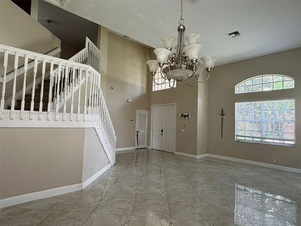 Photo of 4935 NW 57th Ln, Coral Springs, FL 33067 (MLS # A11667417)