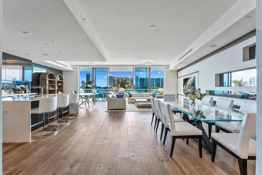 Located in the prestigious ECHO Aventura, Residence 217 offers exceptional waterfront living with expansive interiors, oversized terraces, and stunning bay and skyline views. This beautifully designed flow through residence features wide plank wood flooring, floor to ceiling impact glass, and a spacious open concept layout ideal for both everyday living and entertaining. The sleek chef’s kitchen is equipped with premium appliances, custom cabinetry, and an oversized island overlooking the living and dining areas. The luxurious primary suite offers terrace access, tranquil water views, and a spa inspired bathroom with dual vanities, soaking tub, and glass-enclosed shower. Enjoy seamless indoor-outdoor living from the expansive terraces overlooking the resort-style waterfront pool and Intracoastal views.