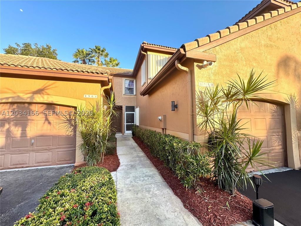 Photo of 1564 Veracruz Ln #1564, Weston, FL 33327 (MLS # A12034166)