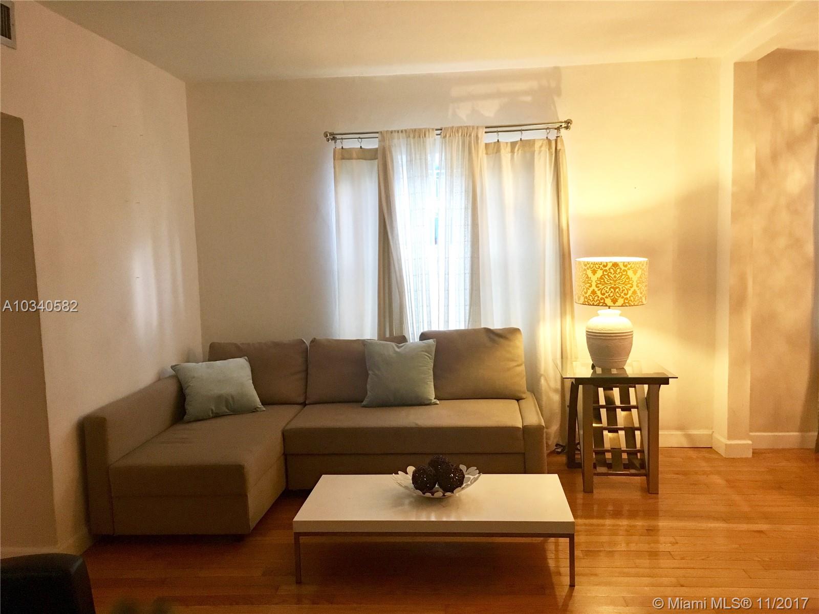 This spacious 680 sq ft furnished 1 bedroom features: Wood flooring, open kitchen with stainless steel appliances, central AC, walk-in utility closet w/ FULL SIZE WASHER and DRYER in Unit, Large bedroom with King size bed and lots of closet space, along with several upgrades done to fixtures and lighting. Walking distance to the beach, Publix supermarket, and restaurants. Ready for move in. Come view today!