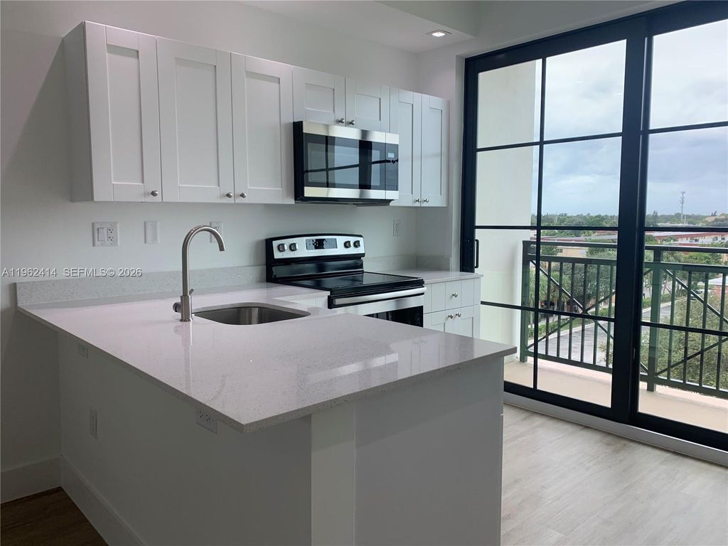 Photo of 4100 Davie Rd #402, Davie, FL 33314 (MLS # A11962414)