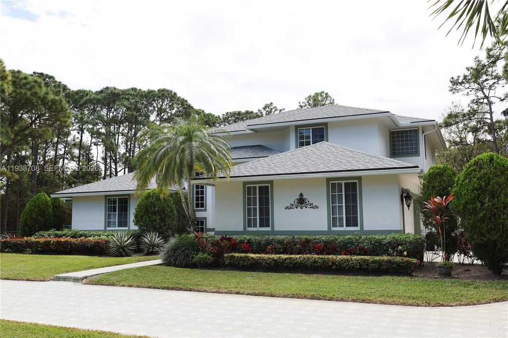 Photo of 7802 N 155th Pl N, Palm Beach Gardens, FL 33418 (MLS # A11938708)