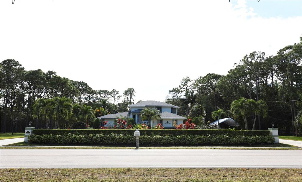 Photo of 7802 N 155th Pl N, Palm Beach Gardens, FL 33418 (MLS # A11938708)