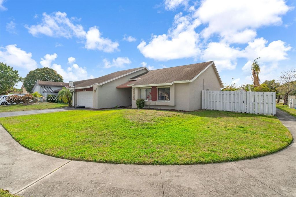 Photo of 8650 NW 46th Ct, Lauderhill, FL 33351 (MLS # A12013936)