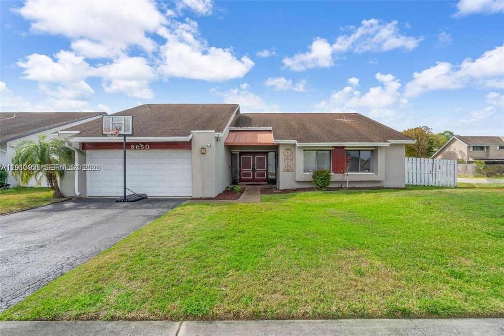 Photo of 8650 NW 46th Ct, Lauderhill, FL 33351 (MLS # A12013936)