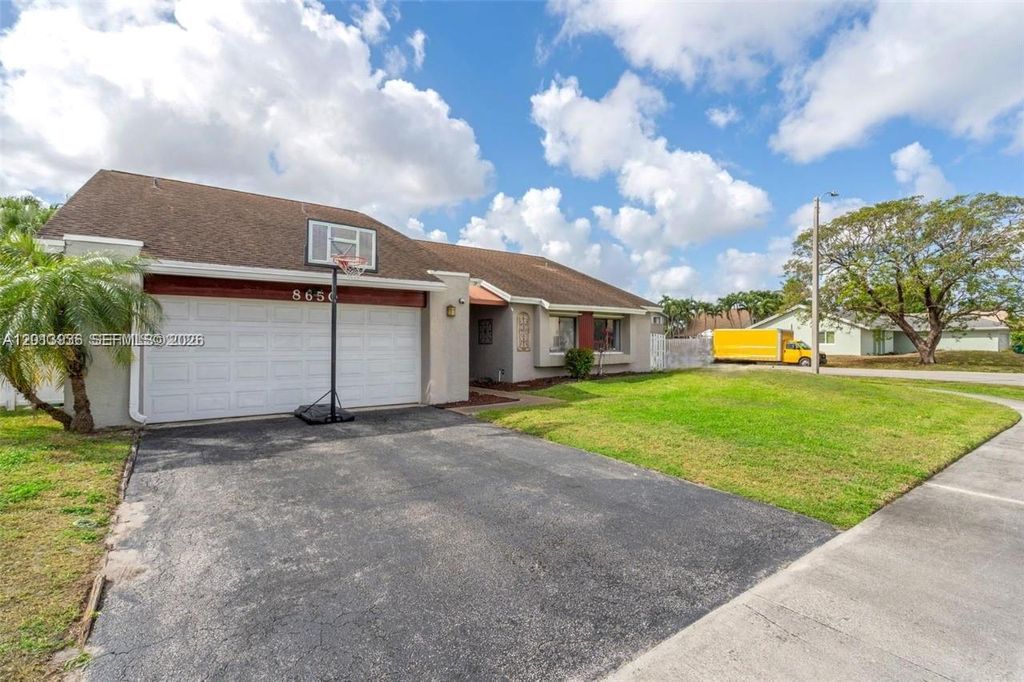 Photo of 8650 NW 46th Ct, Lauderhill, FL 33351 (MLS # A12013936)