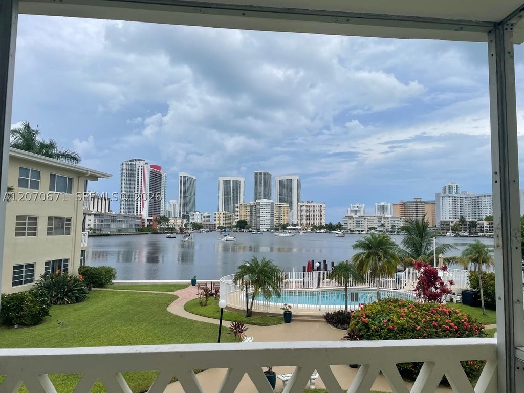 Photo of 450 Golden Isles Dr #2F, Hallandale Beach, FL 33009 (MLS # A12070671)