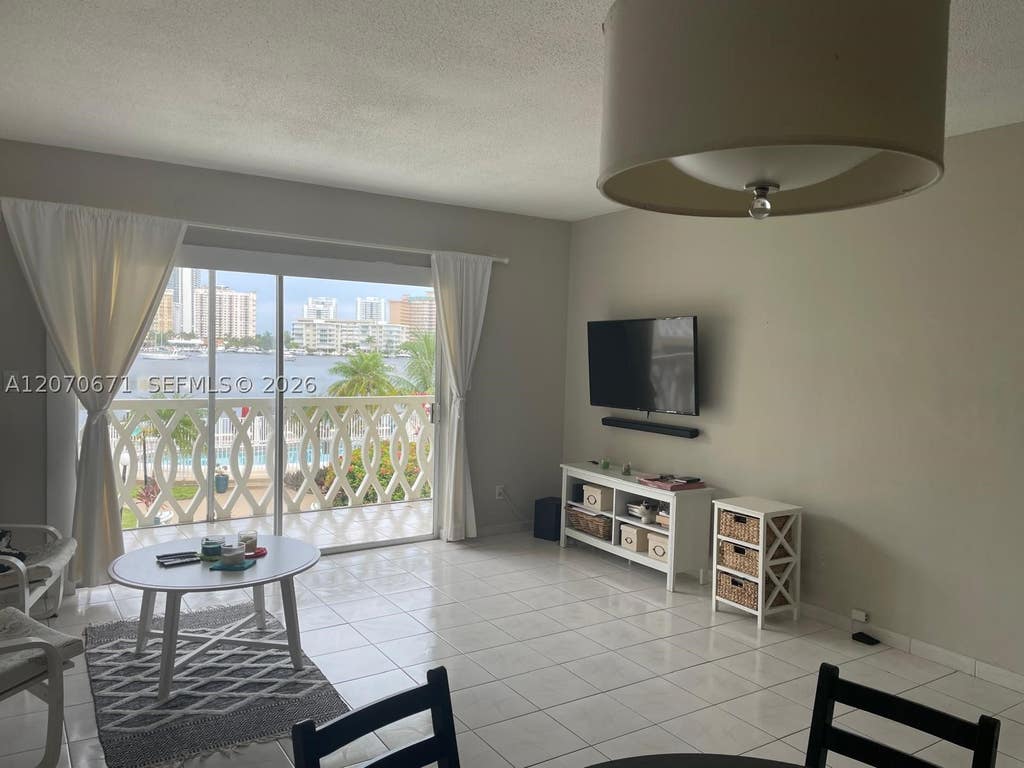 Photo of 450 Golden Isles Dr #2F, Hallandale Beach, FL 33009 (MLS # A12070671)