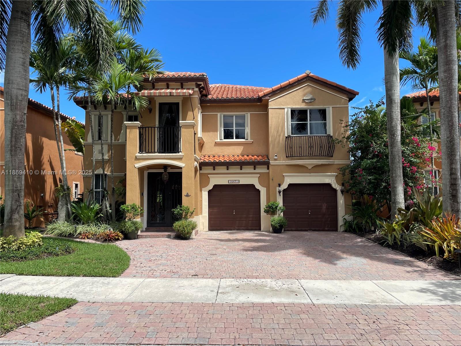 Lakeview home in Bellagio @ Venetian Isles, a gated community with resort-style amenities! This Gem Features 5 beds/4 baths, 2 car garage, wet bar & wine chiller, huge gourmet kitchen w/ KitchenAid Sub-Zero-style fridge and island, tiled 1st floor & wood floors on 2nd floor, updated bathrooms. Enjoy lake views from the back of homes living area's terrace or the private of your master bedrooms balcony. Includes custom window treatments, and access to clubhouse, pool, gym & more. Located in a top-rated A+ school district. (5th bedroom on first floor was opened to expand living area) A must-see home in a fantastic neighborhood!