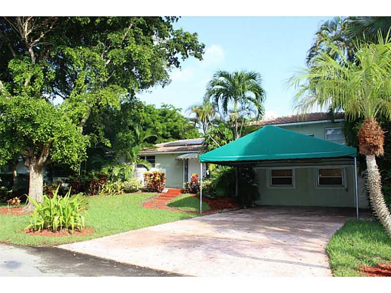 RARE OPPORTUNITY! Spacious water front home in Miami Shores. It's all about location, 2 homes way from open bay. You can dock up to 60-foot boat with no problems. 2 car garage as well. A must see.Miami Shores Country Club & Water Park and Biscayne Ba y nearby, a short drive to Bal Harbor & Beach, a fabulous home.Easy to show on lockbox.