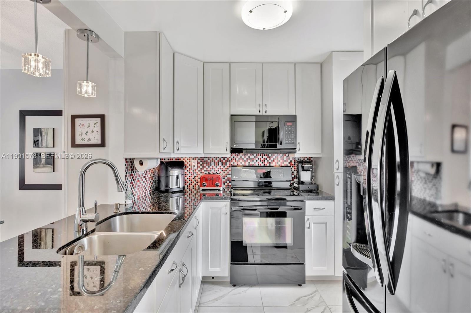 POINCIANA GARDENS CONDO - Residential