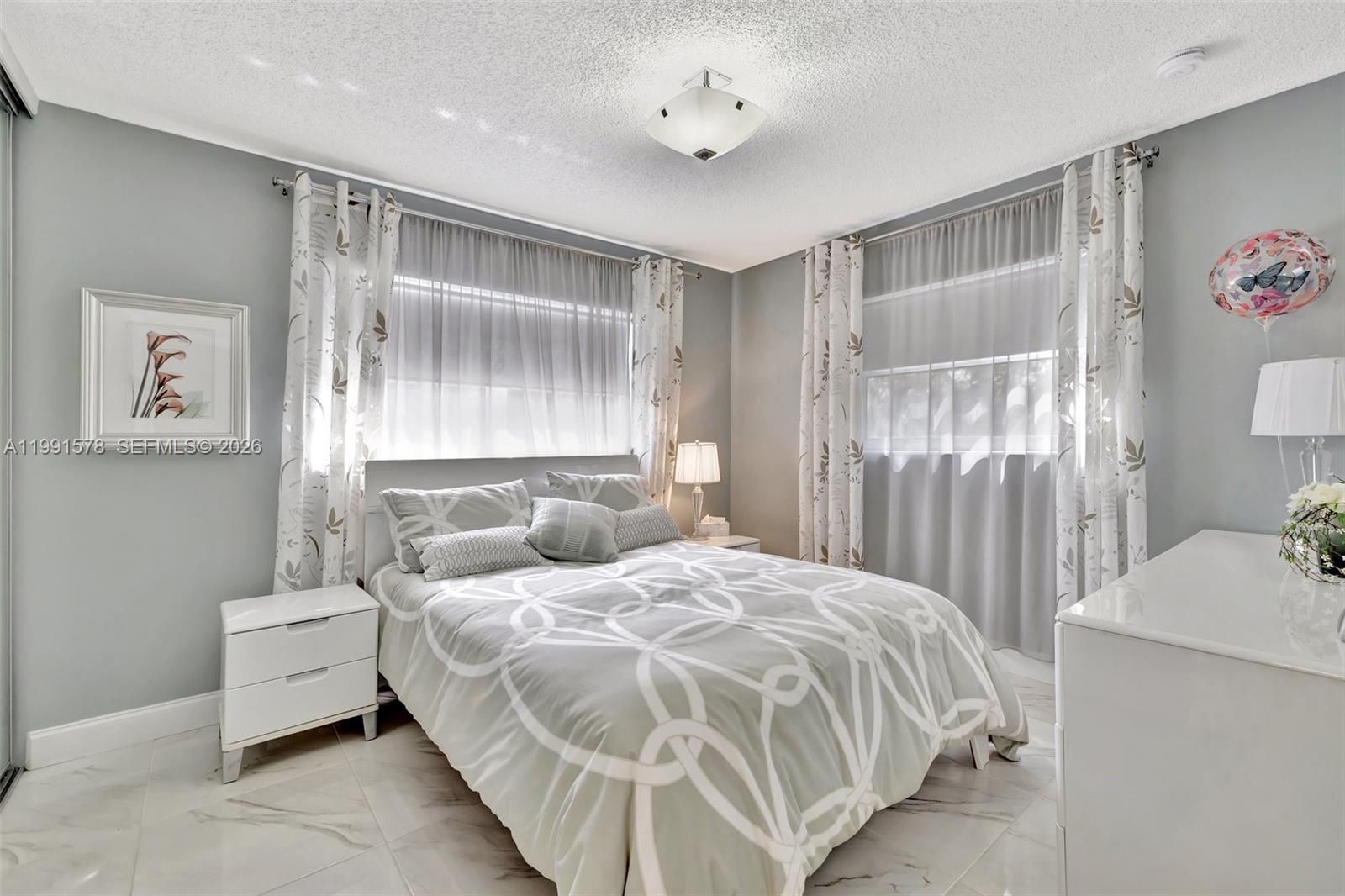 POINCIANA GARDENS CONDO - Residential