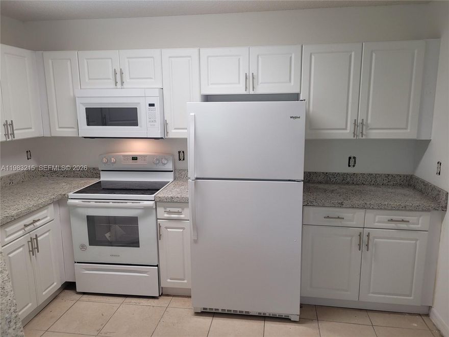 FIRST FLOOR CORNER UNIT 3 Bed, 2 Bathroom, open Tile Flooring throughout. 3rd Bedroom can also be used as a Home Office. Screening Balcony facing the lake. Washer and dryer inside apartment. This Wonderful Condo Home is located in the Windward Lakes Community Amenities including a Pool, Gym, Outdoor Event area, Clubhouse with Reception & Conference Room, Tennis Court, Car Wash area! Water included. One assigned parking space plus guest parking. Minimum credit score of 650 required and income must be 2 and half of the monthly rent. MOVE IN CONDITIONS ONLY 1ST MONTH AND SECURITY DEPOSIT