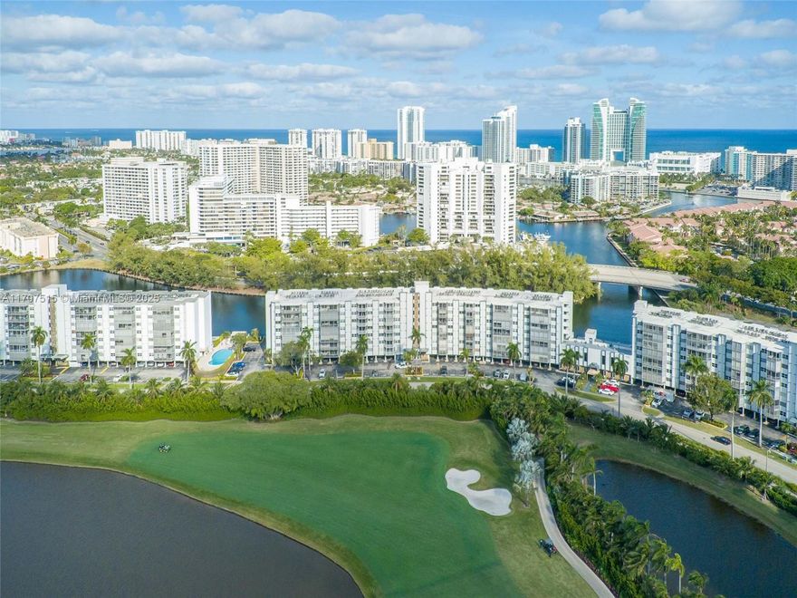 JUST REDUCED! Breathtaking views of the world-renowned Shell Bay Golf Course from your screened in patio. Updated & freshly painted 1bed 1.5bath condo w/open kitchen featuring sleek granite countertops, wine fridge, & ample cabinet space. Primary bedroom with walk-in closet & en-suite bathroom plus additional half bath for guests. Whether you’re seeking a tranquil vacation retreat or a welcoming primary residence, this exclusive community offers a unique sense of belonging, as rentals are not permitted. Premium amenities: gym, game room, swimming pools, sauna & endless water views from community dock. Minutes to the beach, Gulfstream Park, & HardRock. Luxury, convenience & an unbeatable lifestyle. Building has its 40-year certification and a brand-new roof. Job transfer! Seller motivated!
