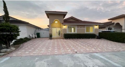 Photo of 8807 NW 109th Ter, Hialeah Gardens, FL 33018 (MLS # A11987057)