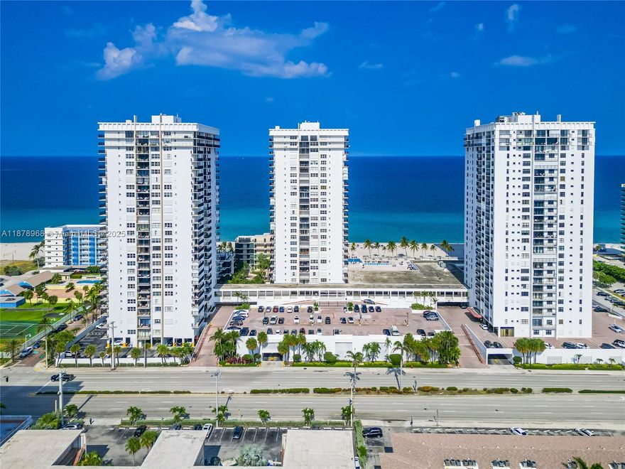 Live the oceanfront lifestyle in this beautiful 2-bed, 2-bath residence at the prestigious Quadomain in Hollywood Beach. Situated on the 4th floor, this spacious unit offers serene ocean views, an open and bright layout, and a private balcony to enjoy the coastal breeze. Features include an updated kitchen and abundant natural light throughout. Resort-style amenities include direct beach access, oceanfront pool deck, fitness center, sauna, beach service, on-site restaurant, 24-hour security, concierge, valet, and secured garage parking. Cable, water, and internet included. Ideal as a full-time home, vacation retreat, or investment property—steps from the sand and minutes to dining, shopping, and entertainment.