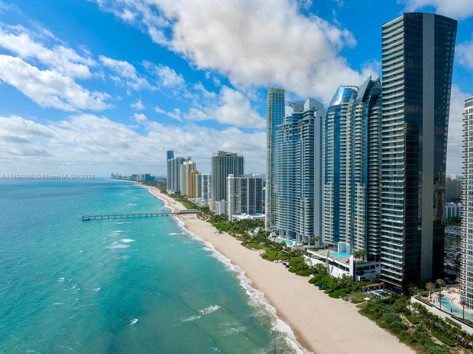 Oceanfront move-in ready luxury 1/2 + Den condo at Jade Ocean in beautiful Sunny Isles Beach.
Enjoy 5-star amenities including a 24-hour concierge, security and valet parking, full pool and beach service, a state-of-the-art gym and spa, a business center, a children's playroom, a café, a theater, assigned parking with private entrance & more. Great location within min to airports.