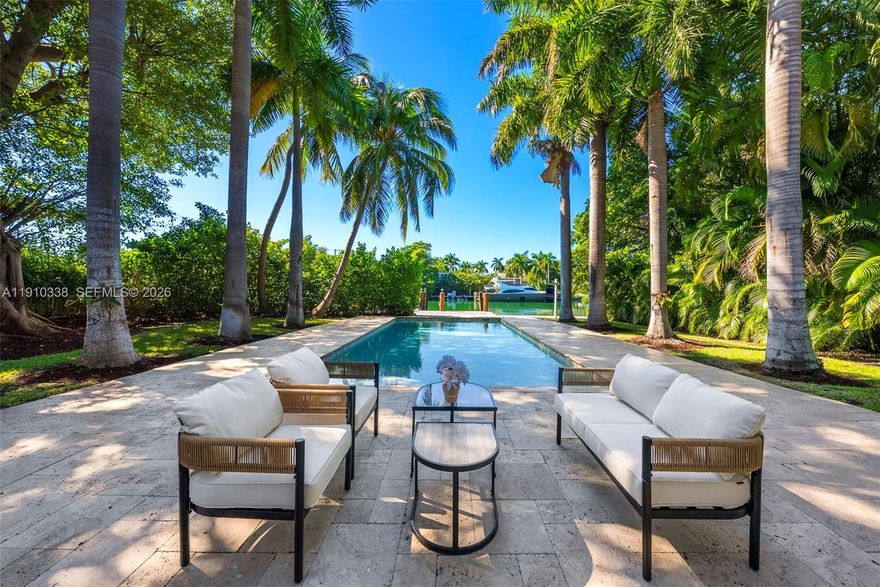 Best price waterfront home on Allison Island - A private waterfront 4035 sqft estate offering refined living inside and out.  This 5-bedroom 4.5 bath home is filled with natural light showcasing open interiors designed for comfort and elegance. Set on an expansive lot of 16,243 sqft with 75 ft of water frontage, and a private dock space that overlooks the open bay water views. 

A spacious, serene primary suite with a private balcony, open living and dining areas, and a gourmet kitchen sets this residence apart. A separate guest house offers a fully equipped kitchen, an expansive living room, and a private gym or home office—an ideal retreat for family and guests. The outdoor space is designed for true waterfront living and effortless entertaining, creating a boater’s paradise with unparalleled access and views. 
Live in one of Miami Beach’s most prestigious neighborhoods, celebrated for its exclusivity and prime waterfront location.
