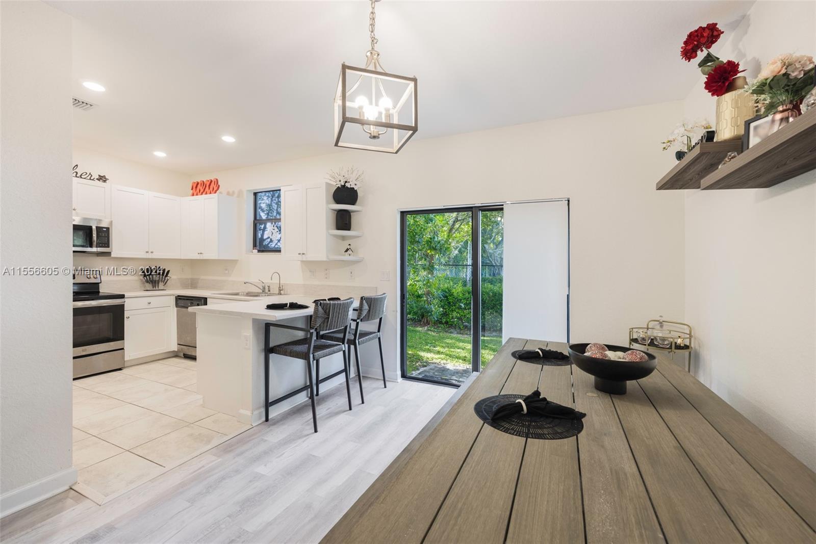 Spacious 3-bed, 2.5-bath townhouse built in 2019 with upscale features. Enjoy modern luxury vinyl flooring installed in the main living area in 2021. This smart home includes Alexa-controlled amenities like a Honeywell thermostat, smart lock, and Ring doorbell. Other Features include a tankless water heater, a water filter system for the entire home, upgraded bedroom closets, and 2nd-floor laundry. Enjoy the tranquility of your private backyard—low HOA ($140) in a lovely community with a lake and pool. Conveniently located near Coral Springs, Coconut Creek, and the Turnpike. Don't miss out!