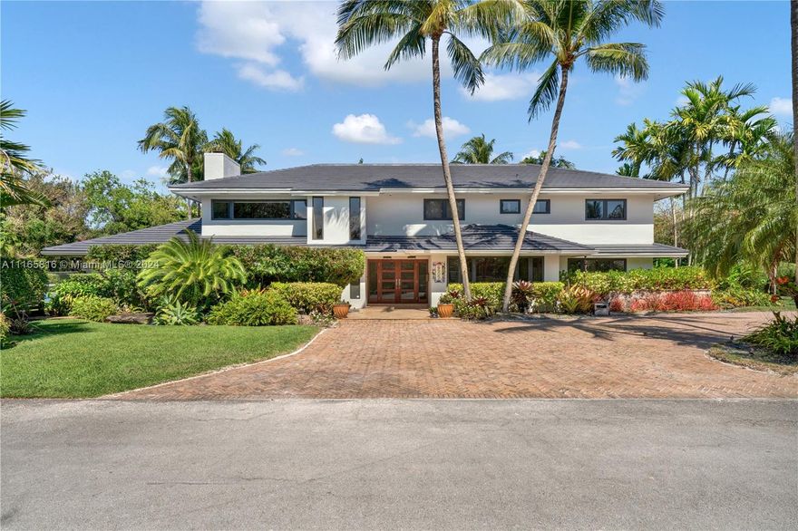 Totally updated home with it's own tennis court on a private 32,000 SF cul-de-sac lot in prime North Pinecrest neighbourhood. This home is perfect for entertaining and was completely redone in 2012 and 2021: It has a large eat-in chefs kitchen with gas stove and two of each main appliance, one microwave and one warming drawer, 5 large en-suite bedrooms upstairs with large closets and on the first floor an extra maid's room and a great room (used as a large office area).The outdoor amenities are endless, from it's own tennis court, oversized pool, covered patio, tikki hut, fire pit and even its own putting green. Other fabulous features include a newer roof, impact windows, special spray foam insulation, a whole house generator, a water softener system and smart home technology.