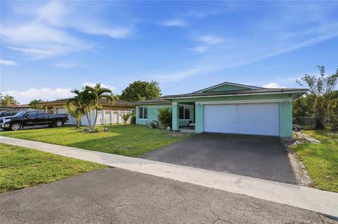 Photo of 8271 NW 68th Ter, Tamarac, FL 33321 (MLS # A12016492)