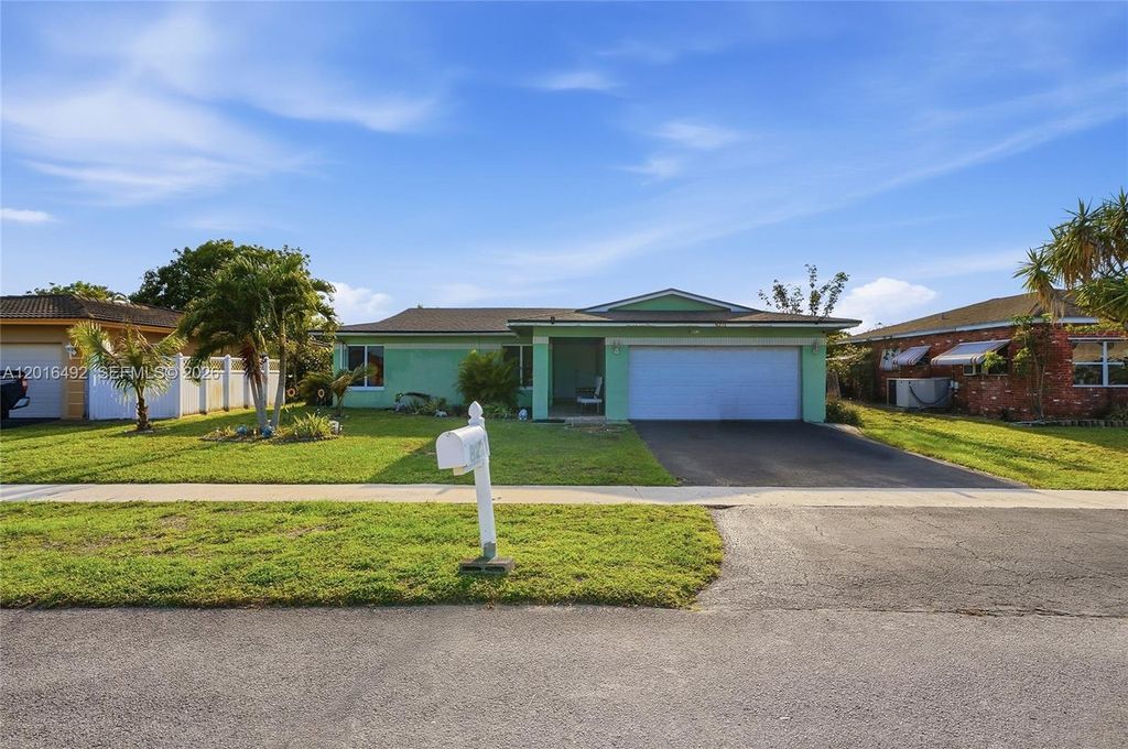 Photo of 8271 NW 68th Ter, Tamarac, FL 33321 (MLS # A12016492)