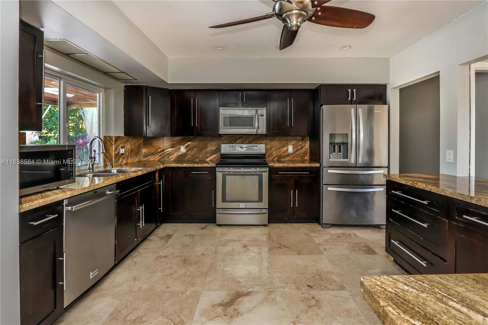 Great opportunity for this 4-bedroom, 2-bathroom, 1 car garage pool home! This beautiful home features a modern, open floor concept with spacious living, dining, and family room. The well-appointed kitchen offers stainless steel appliances, dark cabinetry, and bar seating ideal for entertaining. Additional highlights include NEW A/C. NEW plumbing, and NEW roof that is still under warranty! Outside you'll enjoy a spacious lot with a covered back patio, a swimming pool, jacuzzi hot tub, and lush, vibrant landscaping. Providing both convenience and comfort in a prime location this home is centrally located with easy access to beaches, downtown Hollywood, Aventura Mall, FTL Airport, and I-95.