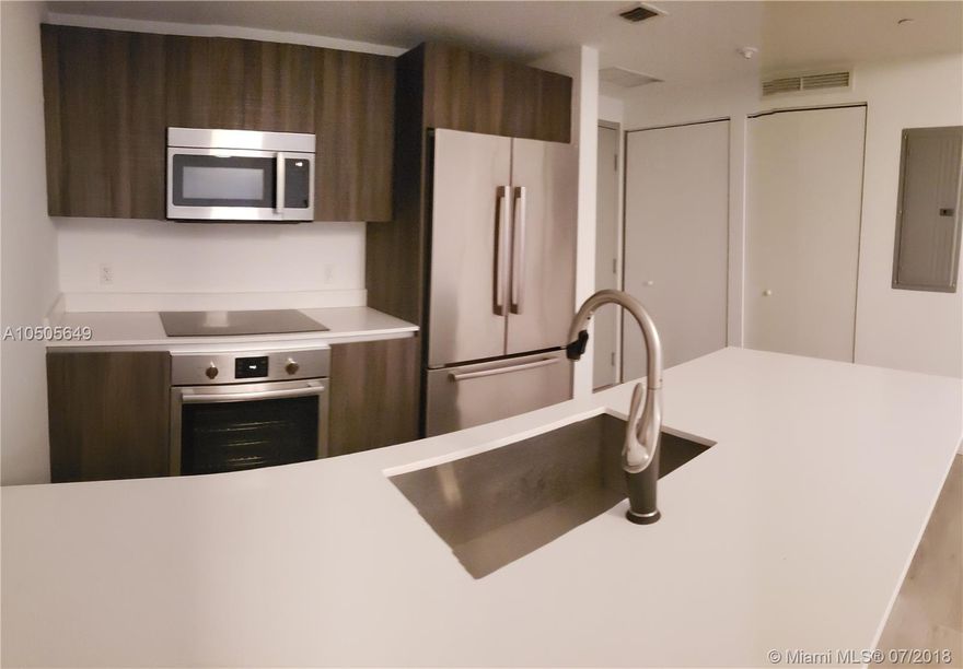 LOCATION! LOWEST PRICE IN BUILDING!! PRICED TO RENT NOW! LUXURIOUS BRAND NEW 1BED/1.5BATHS W/LARGE BALCONY, 1 ASSIGNED PARKING. OVERLOOKING MIAMI CITY. PANORAMIC WINDOWS. PORCELAIN FLOORS THROUGHOUT. BOSCH STAINLESS STEEL APPLIANCES. EUROPEAN CABINETS. BUILT IN CLOSETS. VALET PARKING. EXCLUSIVE 3 FLOORS OVER 25,000 SF OF AMENITIES . THEATER. SPA. ULTIMATE GYM AND YOGA STUDIO. BBQ AREA. SUMMER KITCHEN. 2 CURVED SUNRISE & SUNSET POOLS. CHILDREN ROOM AND POOL. HOT TUB. KIDS PLAYROOM. BUSINESS CENTER. INDOR/OUTDOOR. SOCIAL ROOM . BILLAR/GAME ROOM AND LIBRARY. TEEN LOUNGE. SPORT COURTS. BRAND NEW CONDO BUILT ON WATERFRONT LOT IN THE HEART OF THE ART & ENTERTAINMENT DISTRICT IN EDGEWATER. MIAMI'S MOST TALKED ABOUT NEIGHBORHOOD. BE THE FIRST ONE MOVING TO THIS GLAMOROUS BUILDING. APPOINTMENT ONLY