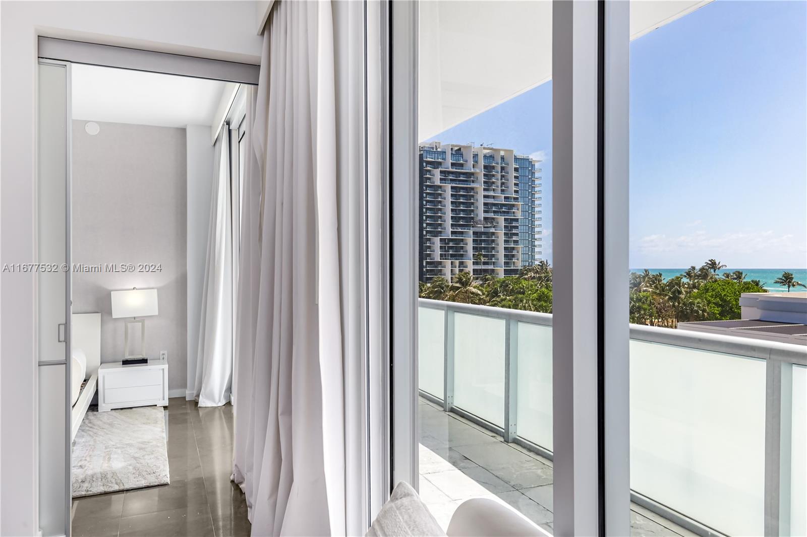 Turnkey fully furnished South Beach condo, located inside the Luxury boutique Boulan Hotel. The interior boasts modern & elegant design, w/ contemporary furnishings. Sliding glass doors open to a double balcony overlooking the Ocean & Collins Ave. Kitchen has top-of-the-line appliances, custom cabinetry, & quartz countertops. Bedroom suite offers views of the ocean and a private balcony. Ensuite bathroom is a spa-like oasis w/ a luxurious soaking tub, walk-in rain shower & a double sink vanity. Washer/dryer in unit. The building offers direct beach access w/ service, rooftop pool, cabanas, gym, 5 star restaurant & 24/7 security. Prime location, fab amenities. Ultimate retreat for those seeking sophisticated beach lifestyle. Excellent option as a permanent or vacation home! Rentals allowed.