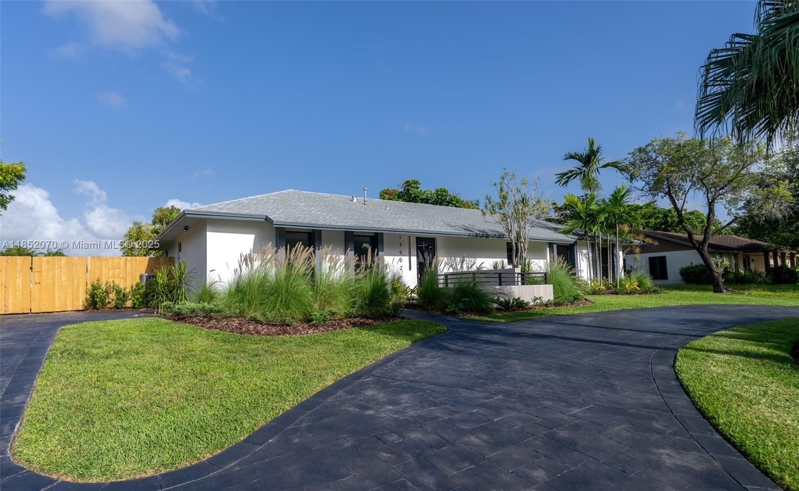 Discover this elegant and completely renovated 4BD/2BA + flex room pool home on a 15,000 sq. ft. lot in the heart of Palmetto Bay. With timeless curb appeal and high-end finishes throughout, this residence blends modern design . The European-inspired kitchen features a 10-ft island, custom cabinetry, and premium appliances—perfect for entertaining. Enjoy an open floor plan filled with natural light, designer bathrooms, and custom closets. A flex room offers space for a home office, den, or playroom. Step outside to a beautifully refinished pool, marble patio, and lush yard—your own private retreat. With impact windows, new A/C, new fence, and top-rated schools nearby, this home is truly move-in ready and built to impress. Schedule your private showing today!