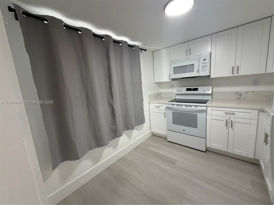 Fully Renovated Unit! 55+ Condo with amazing view. Association has great reserves. Enjoy the large pool and beautiful surroundings. This is an opportunity for being a homeowner in South Florida with modern quartz kitchen and high quality LVP Flooring throughout the unit!
