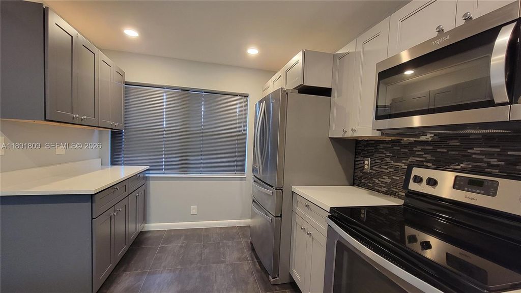 Photo of 2003 Granada Dr #E4, Coconut Creek, FL 33066 (MLS # A11891809)