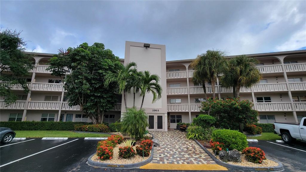 Photo of 2003 Granada Dr #E4, Coconut Creek, FL 33066 (MLS # A11891809)