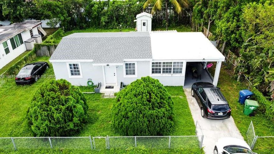 Beautifully updated single-family home in the heart of Miami Gardens, featuring a brand-new shingle roof (2025) for added peace of mind. Inside, this home offers a comfortable living space with tile floors throughout, an updated kitchen with modern finishes, and a renovated bathroom equipped with dual showerheads and a timer for a spa-like experience. The property sits on a spacious 7,500 sq. ft. lot with a fenced yard, perfect for privacy, pets, or entertaining, and also provides covered parking and a large driveway for multiple vehicles. With no HOA and plenty of outdoor space, there is flexibility for gardening, expansion, or simply enjoying the South Florida lifestyle. Conveniently located near local schools, shopping, dining, parks, and major highways.