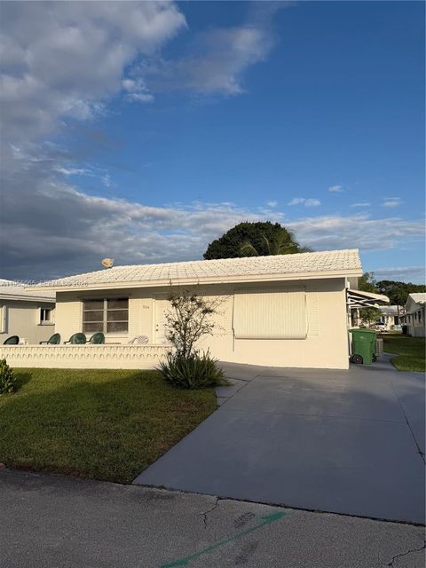 Photo of 7004 NW 67th Ave, Tamarac, FL 33321 (MLS # A11955065)