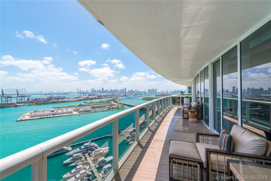 Enjoy the best SoFi has to offer in this superbly versatile 4 bed layout showcasing splendid bay and city views. Smartly designed storage/shelving brings function to this beautiful flow through home with sunrise/sunset terraces. Features large butler’s pantry, laundry room and staff nook. Custom, open chef kitchen with island and integrated professional appliances has you planning your next dinner. Master bedroom boasts generous closets and renovated ensuite bath. Complete with marble floors, 1 bedroom turned into office with great bay views and ensuite bathroom, automatic shades in rooms plus more. Rents at $15,200/month. Available as of 6/1/18.  Full service bay building with cafe, concierge, tennis court, pool and gym.